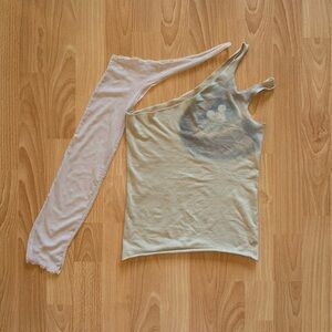 Beige cut out assymetrical tank and mesh sleeve